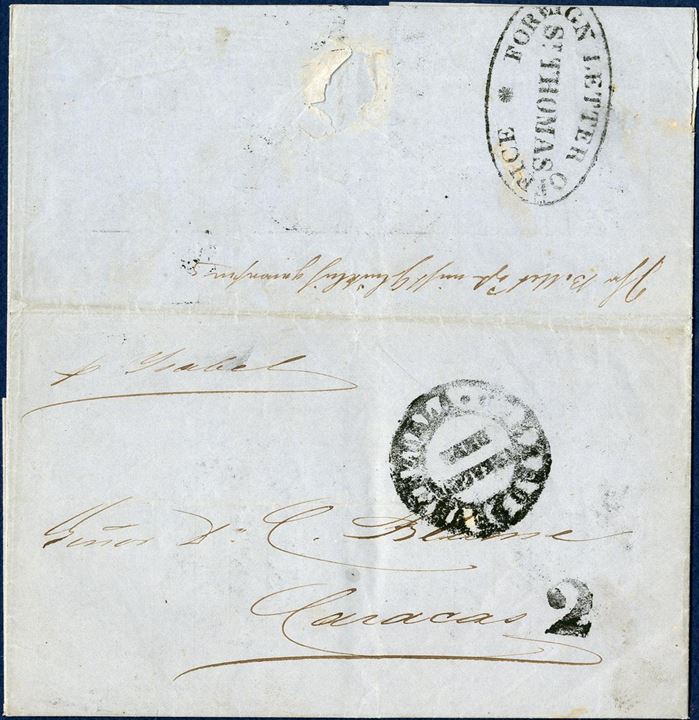 Entire dated St. Thomas 14. September 1855 to Caracas, Venezuela. Sent through and stamped with “FOREIGN LETTER OFFICE - ST. THOMAS” on reverse. Routing instruction “pr. Isabel”, Venezuelan receiving mark struck on front and charged “2” reales due by addressee. Merchants in St. Thomas maintained the office from 1846 to 1860. Mail was bagged and shipped by private packets to avoid high charges of inconvenient schedules.