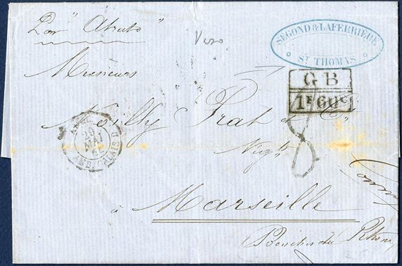 Unpaid letter docketed St. Thomas 13 May 1863 to Marseille via London. Sender’s cachet “SEGOND & LAFERRIÈRE / ST. THOMAS” struck on front, routing order – Par ”Atrato” RMSPC “Atrato” to London. On reverse British double ring small type “ST. THOMAS MY14 1864”, 1-ring “J M / LONDON / MY-28 / 64”, “PARIS / 29MAI 64 / 60”, “3 MARSEILLE 3 / 30 MAI 64 / (12)” and on front “ANGL. / 29 MAI 64 / AMB. CALAIS D” and struck accountancy mark “GB // 1F60C” and numeral type “8” decimes due by addressee.