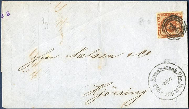 Domestic letter sent from Itzehoe to Hjørring bearing a 4 sk. 1863 rouletted issue tied by numeral “206” alongside railroad mark “Elmsh-Itzeh.Ebn.Post.Bur: 8/9 1863”.