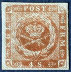 Colour proof of 4 sk. 1854 plate IV, with missing imprint on the left side of the design and likely from the left column of stamps, without gum and burelage IIb printed in blue colour and dotted spandrels. In the Postal Museum the printing plate has empty spandrels in the lower half sheet of 50 stamps. Plate IV has been used for the last 1854 printing IV delivered from 16 June 1859. It is not known why this plate has had the spandrels removed, but perhaps experiments were made for a new design without spandrels and trials for another burelage colour since the yellow one that were used were sometimes almost invisible.