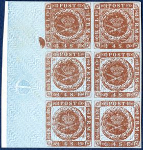 Colour proof of 4 sk. 1854 plate IV, block of six with full left sheet margin, pos. 41-42 / 51-52 / 61-62, without gum and burelage IIb printed in blue colour and dotted spandrels. The two stamps above with dotted spandrels and the lower four stamps with empty spandrels - a very rare example the upper and lower half sheet. In the Postal Museum the printing plate has empty spandrels in the lower half sheet of 50 stamps. Plate IV has been used for the last 1854 printing IV delivered from 16 June 1859. It is not known why this plate has had the spandrels removed, but perhaps experiments were made for a new design without spandrels and trials for another burelage colour since the yellow one that were used were sometimes almost invisible.