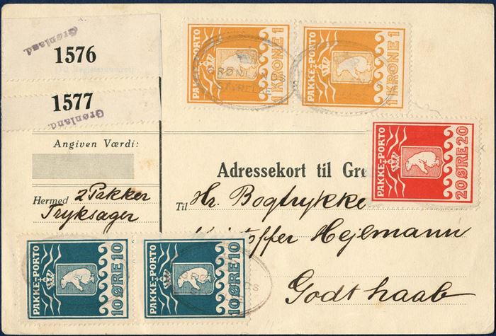Parcel card to Hejlmann, Godthaab. Two 10 øre 1915 IV printing, 20 øre VII printing 1915 and two 1 kr. 1930 (AFA 7, 9, 11) tied by oval mark “GRØNLANDS STYRELSE” in black, GF1, no. 21.00). Two PRINTED MATTER parcels weighing each 5-10 kg, 120 øre per parcel 1931-rate, correct 240 øre franking. Sent with „Disko” from Copenhagen 6 October 1933. Parcel card “Form. Ah. 57019” GF13.
