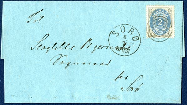 Local letter with 2 sk. bicoulored VII printing pos. 77 INVERTED FRAME on dated letter Sorø 10 July 1874, cancelled with numeral ‘67’ alongside datestamp ‘SORØ 5/7 6 POST’. A very beautiful and lightly cancelled stamp on a clean and small sized envelope. Rare in this quality.