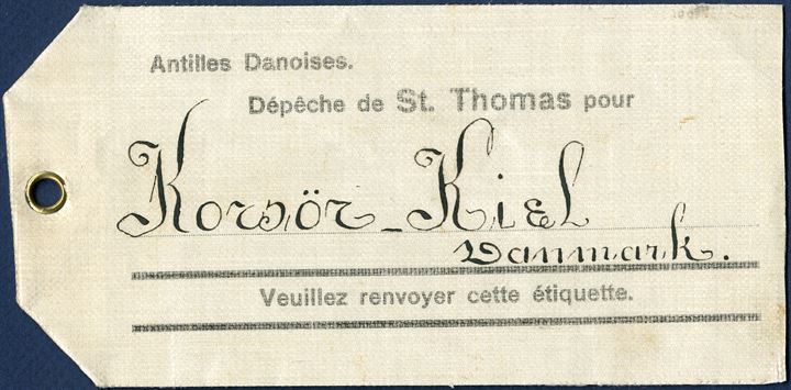 St. Thomas manilla label with preprinted 'Antilles Danoises. / Dépêche de St. Thomas pour /  ......   / Veuillez revoyer cette étiquette. ', with added text 'Korsör - Kiel, Danmark.' - For mailbag sent directly with Danish ship to Korsör from Danish West Indies. Only recorded such manilla label.