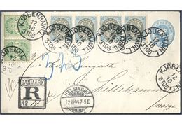 4 øre stationery envelope uprated with 4-strip 3 øre bicoulored and pair 5 øre arms-type cancelled with 'KJØBENHAVN.L. 12/10 3 TOG' on registered letter to Lillehammer, Norway. Transitstamped 'HELSINGØR 12.10.94 7-9E' and registration mark 'DANMARK / R / No. 14'. Correct 10 øre letter rate to Norway plus 16 øre registration fee, total 26 øre. A very decorative letter.