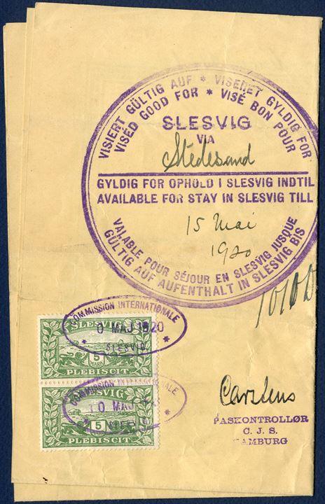 German Personalausweis Nr. 77, issued in Lüneburg 6 Mai 1921, valid until 5 Mai 1921. Issued for Anna Schuhmann, Geboren Hansen. On the back of the Reisepass, Plebiscit “Reise-Pas” issued Hamburg and stamped with the large VISA mark “Vised good for” stay in Slesvig at the border crossing Stedesand, 10. Maj 1920 and valid for stay in Slesvig until 15 Mai 1920. Pair of Plebiscit SLESVIG 5 MK used as fiscal duty stamp, cancelled with oval “CIS 10. MAJ. 1920 SLESVIG” and oval CIS Stedesand cachet.