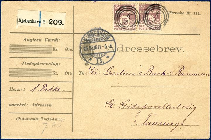 Parcel letter (Adressebrev) 7,80 kg. from Copenhagen Railroad station 26 May 1906 to Taasinge. Pair 15 øre lilac wavy-line, tied by 3-ring 'K 2' Esrom type alongside swiss type 'KJØBENHAVN 26.5.06 11-5-E *B.* ', parcel label 'Kjøbenhavn B 209.' and backstamped 'TAASINGE 27.5.06 7-8F'. Vagn Jensen recorded from 3.3.1910 - 5.10.1916, this letter is postmarked June 1906.