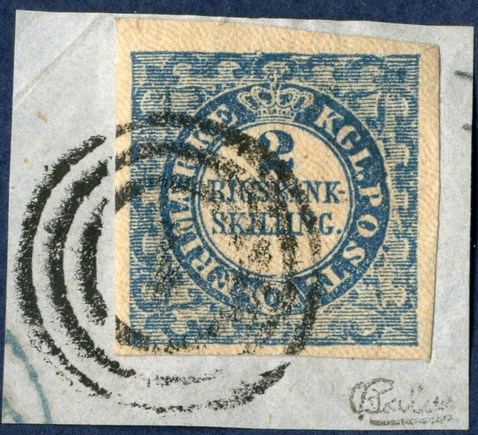 2 Rigsbankskilling Thiele printing, plate I-34, Type 8 on piece. Fine margins, cancelled with numeral ”1” Copenhagen. Major plate flaw with white line from the N-frame all the way down along KGL. PO. This is a significant and large plate flaw.