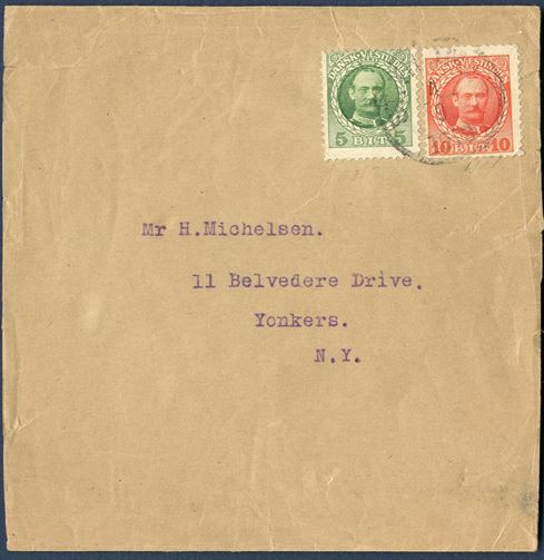 15 BIT printed matter wrapper band sent form St. Thomas to New York, bearing a 5 and 10 BIT King Frederik VIII issue tied by CDS “ST. THOMAS 14.9.1913. Plate flaw on 10 BIT, with uneven frame line under left figure 10, AFA spec. 37z. 15 BIT third printed matter rate, each 5 BIT weight step.