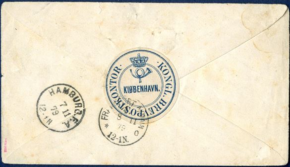 Unpaid parcel letter from Copenhagen 6 November 1879 to Frankurt a/m, Germany. Parcel registration label 'Fra Kbh. Pakke. 679' and cds 'KJØBENHAVN PP 6/11', Slesvig border transit mark boxed 'Aus /über) Dänemark / via Hamburg 2 / Porto von Woyens'. Charged '100' in blue crayon, backstamped Hamburg 7/11 and Frankfurt a/m 8/11 79. Rare sealing label in blue on back ' ·KONGL.BREVPOSTKONTOR / KIØBENHAVN.' with crown and posthorn in the seal.